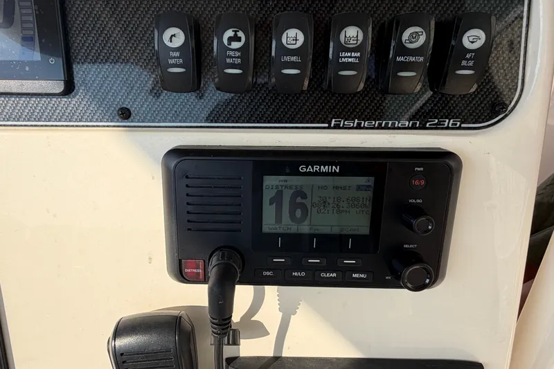 Slide: The Image of Control panel of 2024 Grady-White Fisherman 236 with Garmin marine radio. - 43