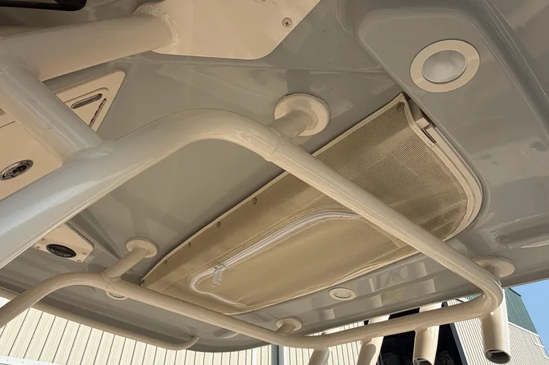 Slide: The Image of 2024 Grady-White Fisherman 236 boat interior ceiling with storage compartment and lighting. - 53