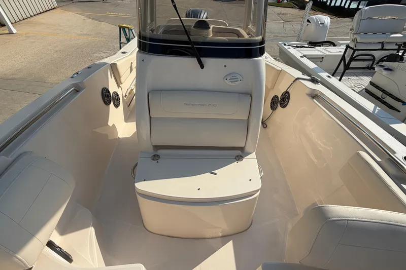 Slide: The Image of 2024 Grady-White Fisherman 236 boat interior with seating and console. - 66
