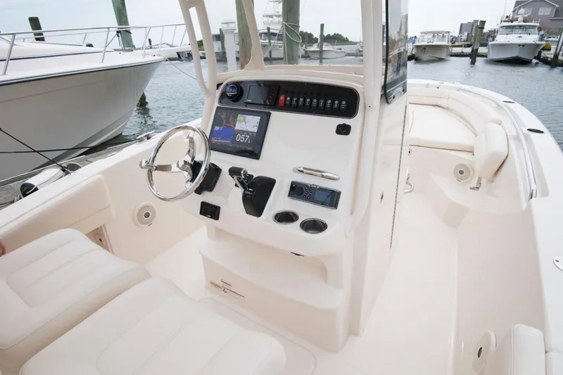 Slide: The Image of Manufacturer Provided Image: 2024 Grady-White Fisherman 236 boat interior with helm station and seating. - 7