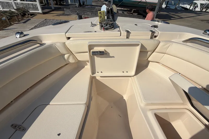 Slide: The Image of 2024 Grady-White Fisherman 236 boat interior with seating and storage compartments. - 73
