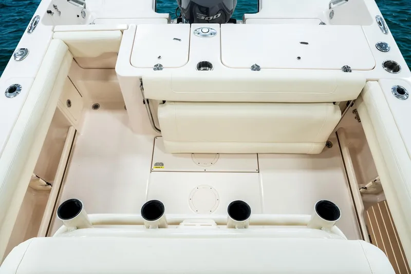 Slide: The Image of Manufacturer Provided Image: 2024 Grady-White Fisherman 236 boat interior with rod holders and storage compartments. - 8