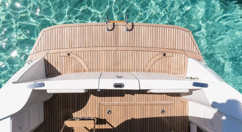 Slide: The Image of Manufacturer Provided Image: 2020 Beneteau Swift Trawler 30 cruising on open sea, showcasing sleek design and performance. - 22