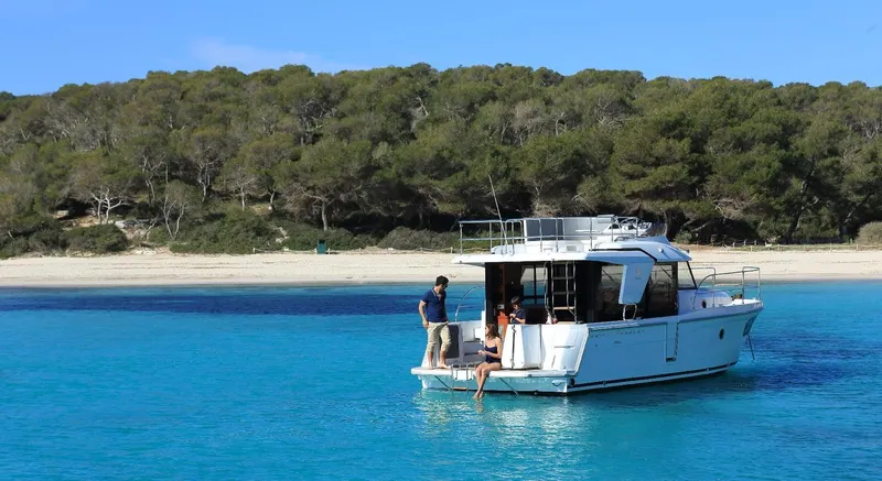 Slide: The Image of Interior of 2020 Beneteau Swift Trawler 30 with TV and porthole view. - 8