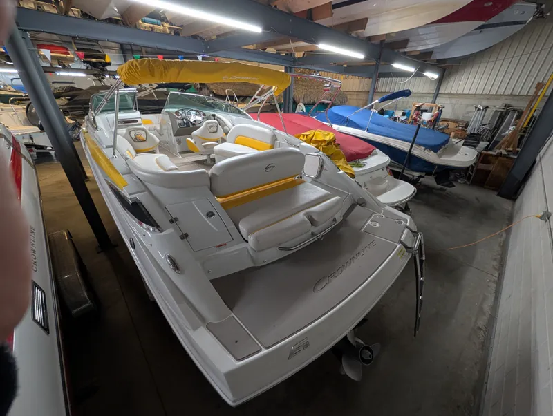 Slide: The Image of 2015 Crownline Eclipse E6 boat in storage facility. - 7