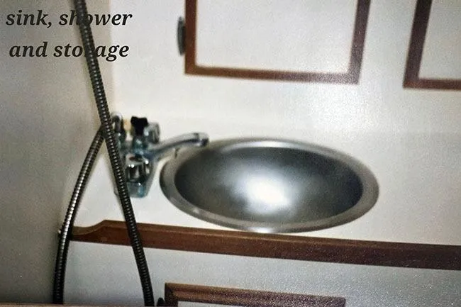 Slide: The Image of 1980 Cape Dory 33 yacht bathroom with sink, shower, and storage. - 19