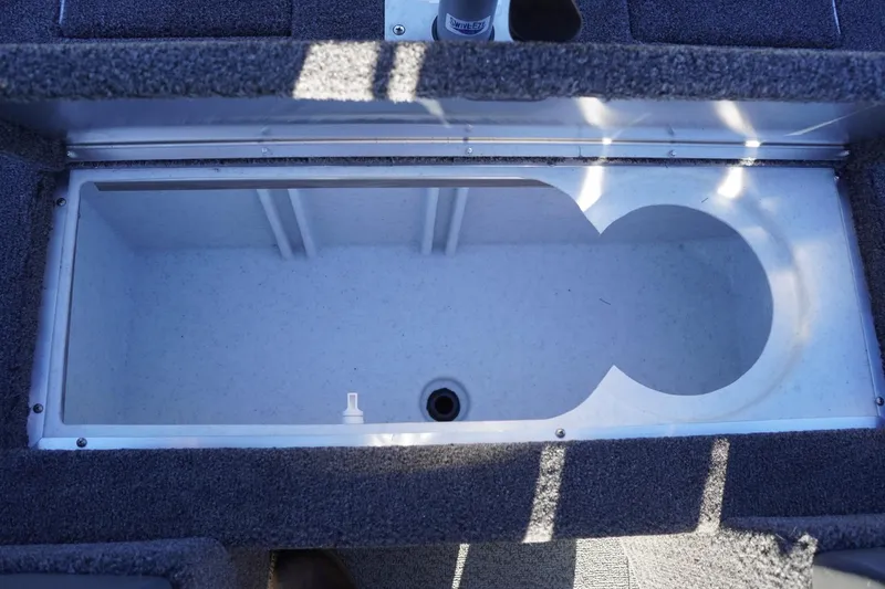 Slide: The Image of 2026 Lowe Fishing Machine 1625WT livewell interior, featuring spacious design and durable construction. - 24