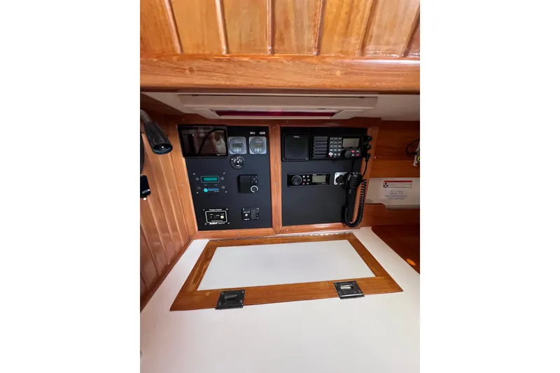 Slide: The Image of Control panel of a 1990 Cabo Rico 38R sailboat with navigation equipment. - 16