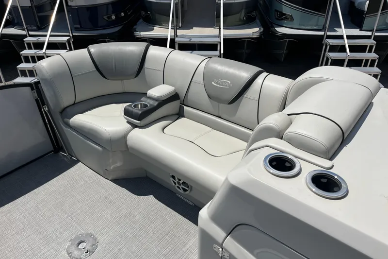 Slide: The Image of Luxurious seating on 2017 Sylvan Mandalay 8525 Sportlounger Twin boat with cup holders. - 14