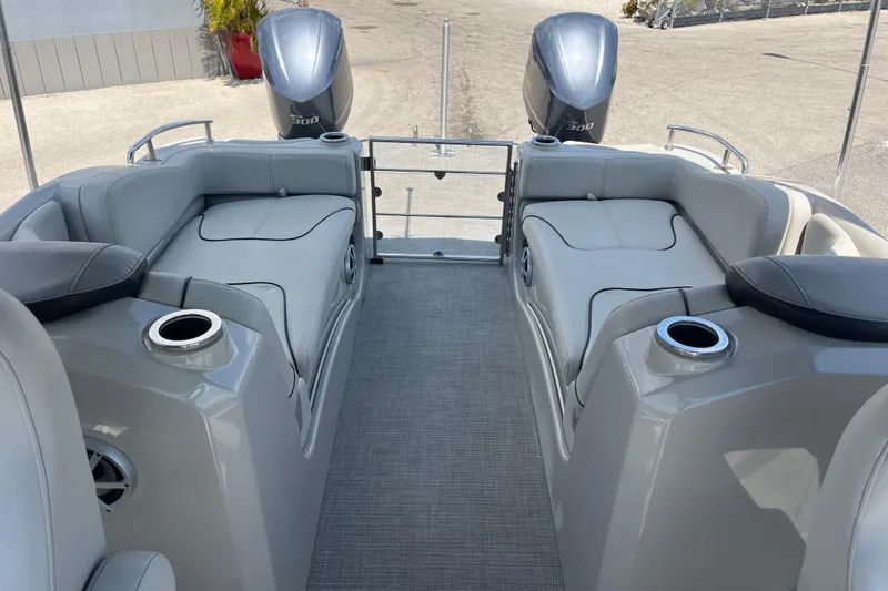 Slide: The Image of 2017 Sylvan Mandalay 8525 Sportlounger Twin with dual engines and luxurious seating. - 19