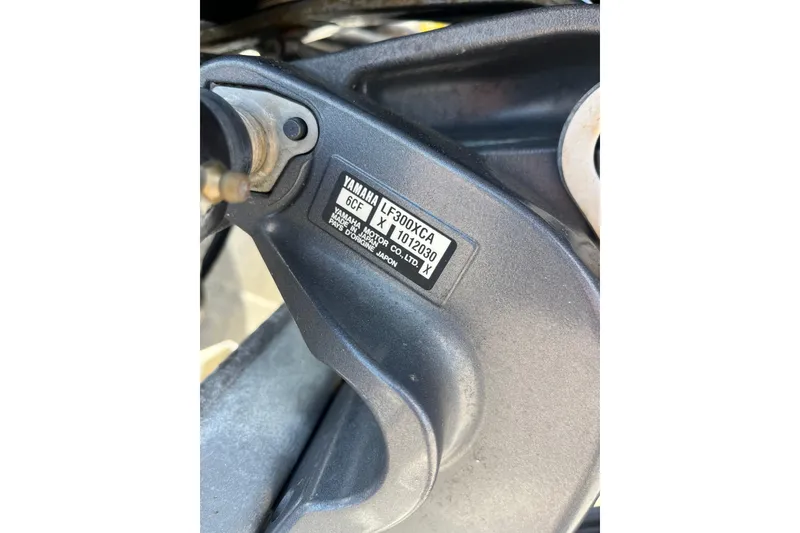 Slide: The Image of Close-up of Yamaha motor part on 2017 Sylvan Mandalay 8525 Sportlounger Twin. - 24