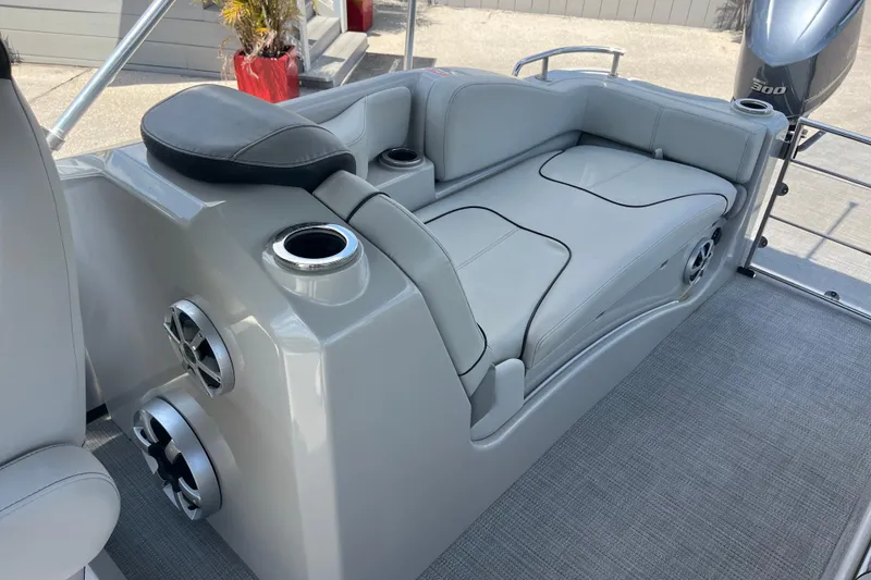 Slide: The Image of 2017 Sylvan Mandalay 8525 Sportlounger Twin with sleek seating and integrated cup holders. - 20