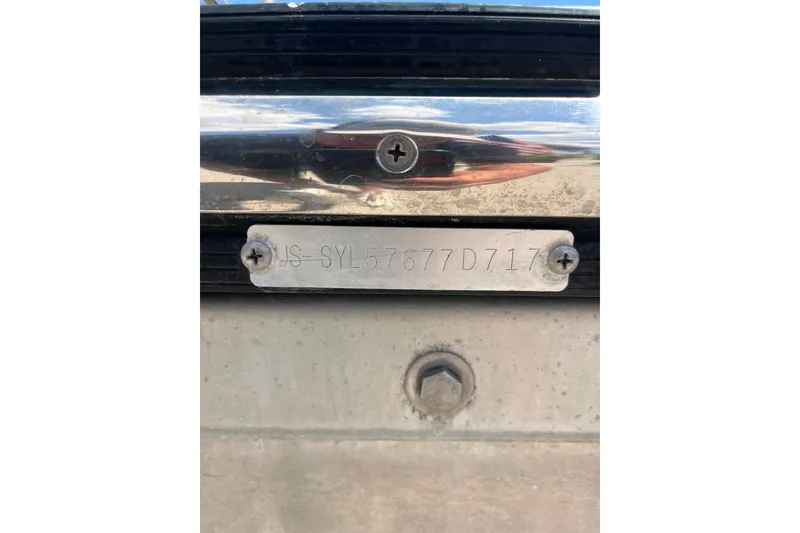 Slide: The Image of Close-up of a 2017 Sylvan Mandalay 8525 Sportlounger Twin serial number plate. - 22
