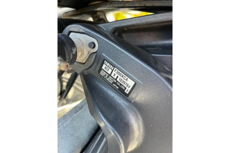 Slide: The Image of Close-up of Yamaha engine part on 2017 Sylvan Mandalay 8525 Sportlounger Twin. - 23