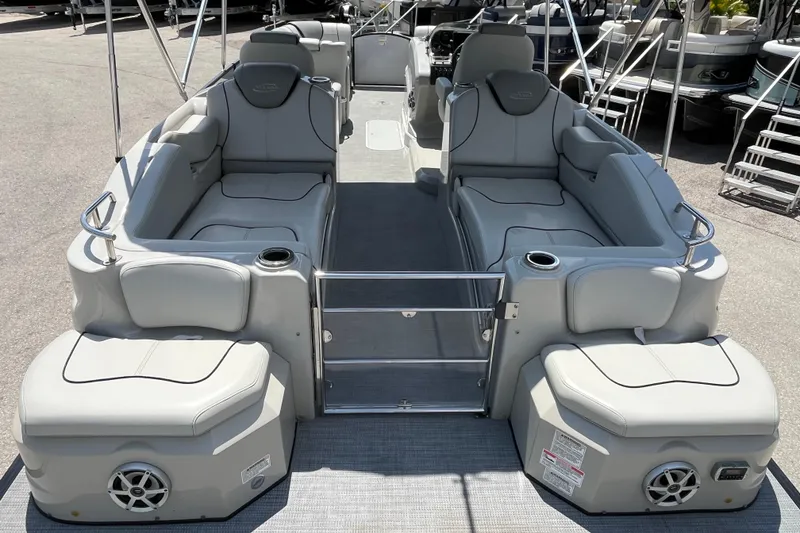 Slide: The Image of 2017 Sylvan Mandalay 8525 Sportlounger Twin pontoon boat with spacious seating and modern design. - 8
