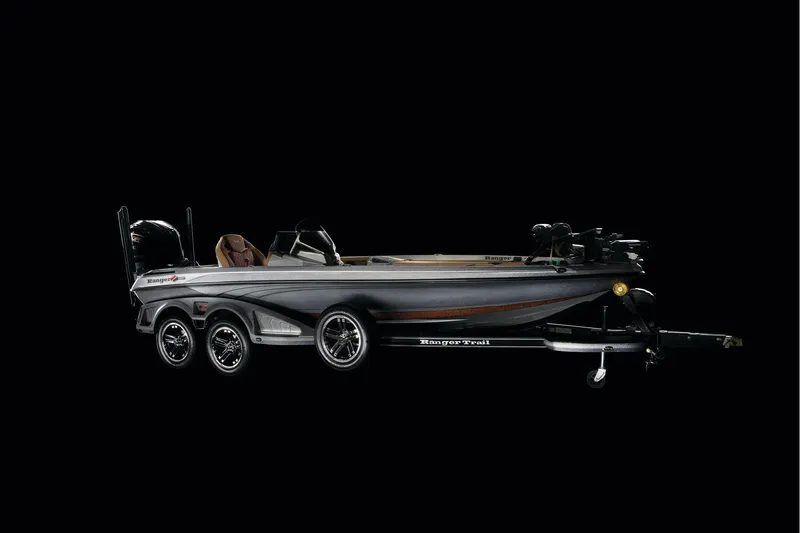 Slide: The Image of Manufacturer Provided Image: 2026 Ranger Z520R Ultra boat on trailer, sleek design, black background. - 13
