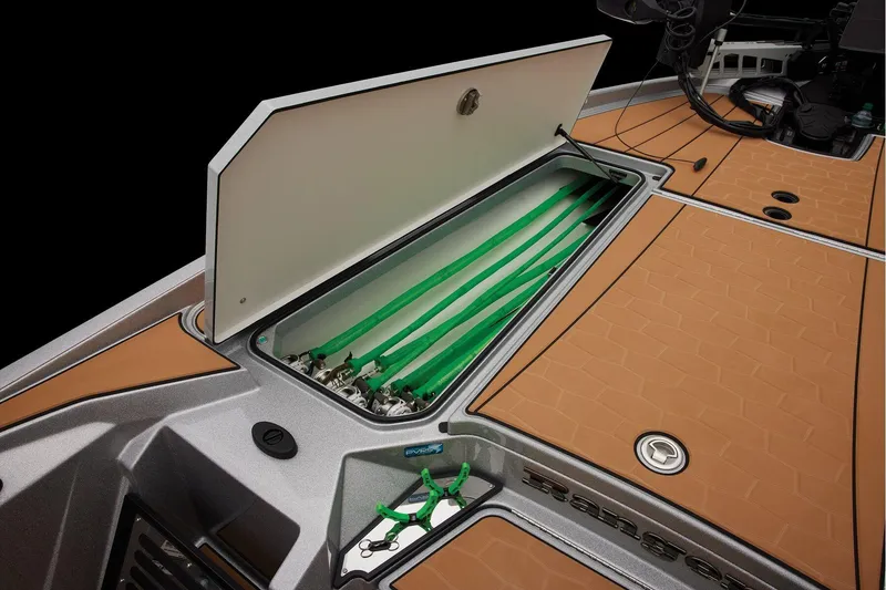 Slide: The Image of Manufacturer Provided Image: 2026 Ranger Z520R Ultra boat with open storage compartment and green rods. - 20