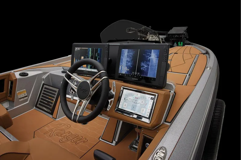 Slide: The Image of Manufacturer Provided Image: 2026 Ranger Z520R Ultra boat dashboard with advanced navigation displays and sleek design. - 39