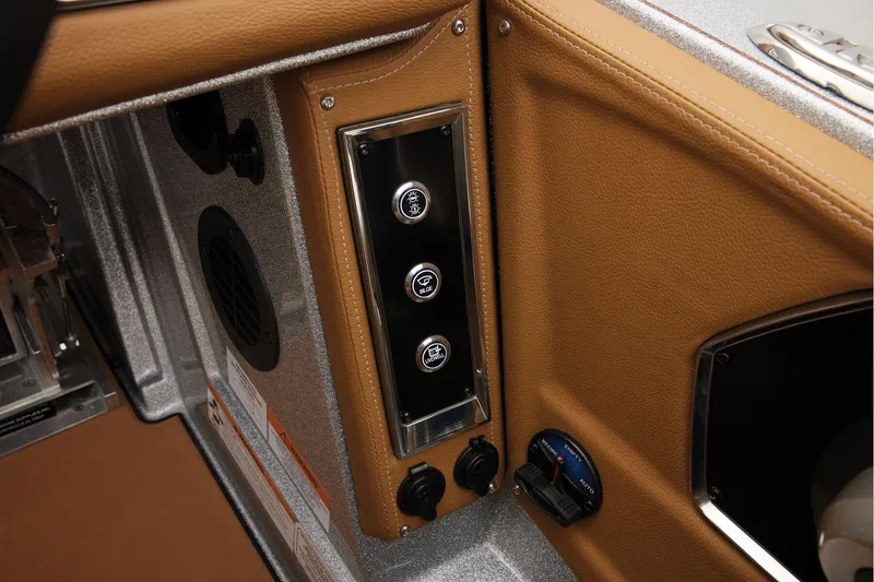 Slide: The Image of Manufacturer Provided Image: 2026 Ranger Z520R Ultra boat interior control panel with leather trim. - 40