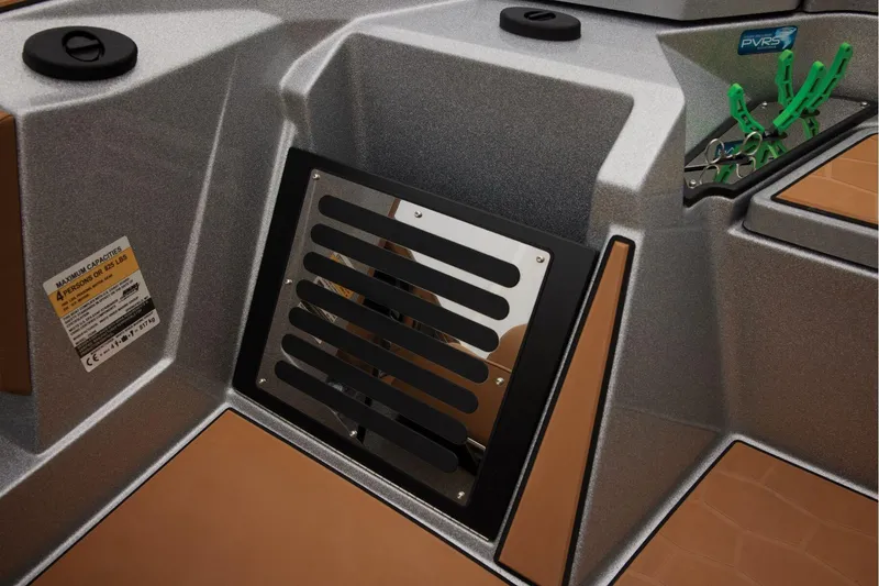 Slide: The Image of Manufacturer Provided Image: 2026 Ranger Z520R Ultra boat interior with storage compartment and capacity label. - 43