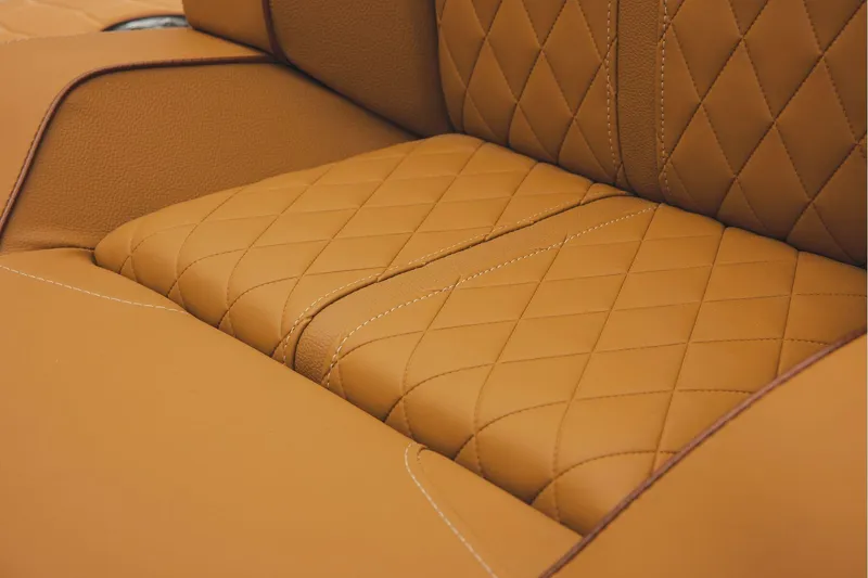 Slide: The Image of Manufacturer Provided Image: Luxurious tan leather seat with diamond stitching in 2026 Ranger Z520R Ultra. - 47