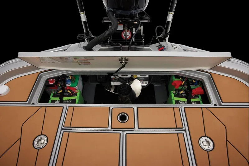 Slide: The Image of Manufacturer Provided Image: 2026 Ranger Z520R Ultra boat interior with open hatch, revealing batteries and equipment. - 56