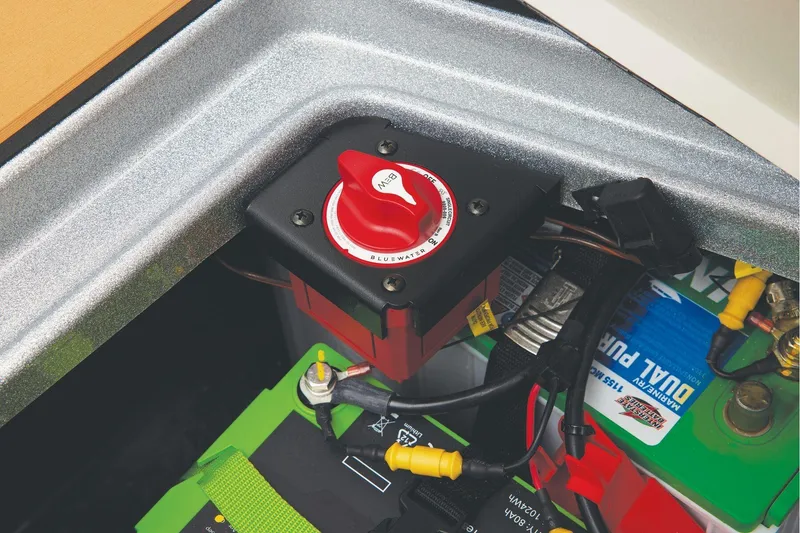 Slide: The Image of Manufacturer Provided Image: Battery compartment of 2026 Ranger Z520R Ultra with switch and wiring. - 57