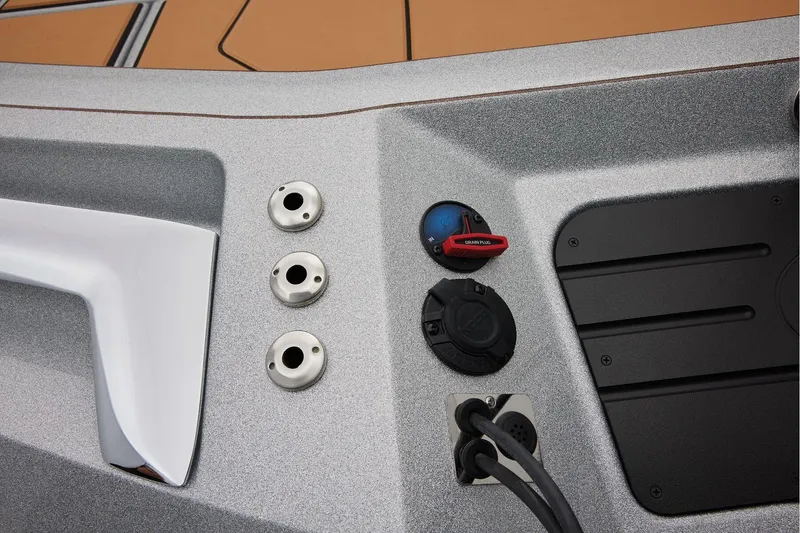 Slide: The Image of Manufacturer Provided Image: 2026 Ranger Z520R Ultra boat dashboard with controls and plug sockets. - 63