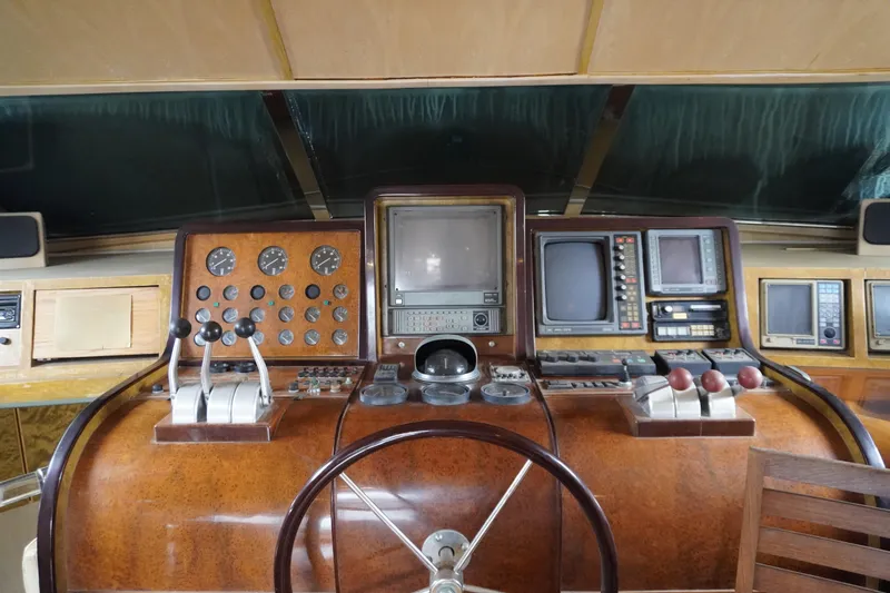 Slide: The Image of 1992 Horizon Power Boat dashboard with vintage controls and navigation equipment. - 4