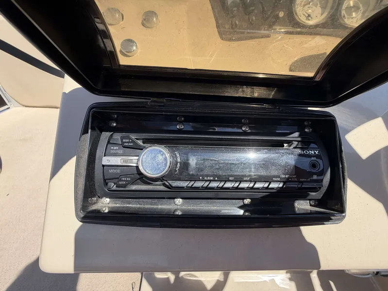 Slide: The Image of Sony car stereo in a 2013 Harris Cruiser 240 boat. - 12