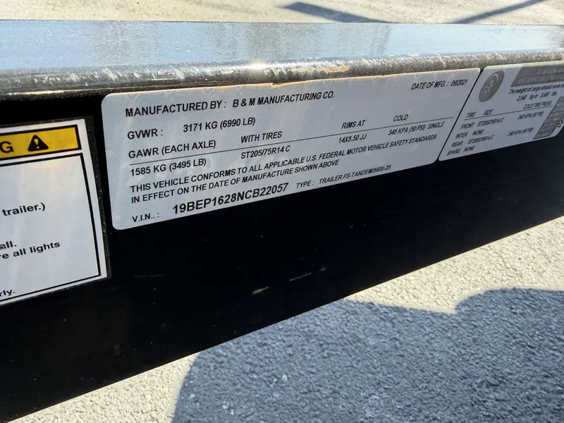 Slide: The Image of Label on a 2013 Harris Cruiser 240 boat trailer. - 18