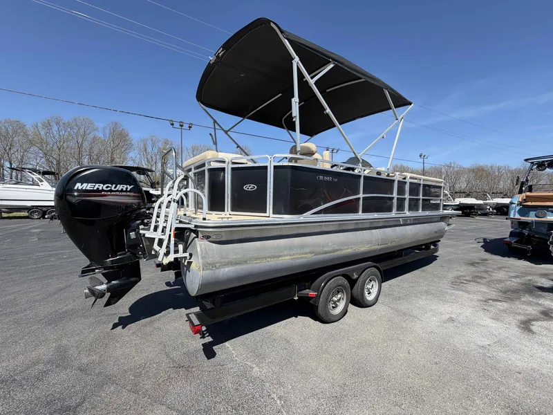 Slide: The Image of 2013 Harris Cruiser 240 pontoon boat with Mercury engine on trailer. - 4