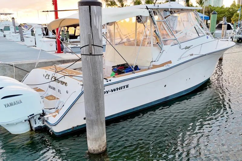 Slide: The Image of 2006 Grady-White Express 330 boat docked with Yamaha engines. - 2