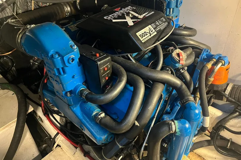 Slide: The Image of Engine of a 1996 Tiara Yachts 3500 Express, featuring a powerful Crusader 502 XL motor. - 100