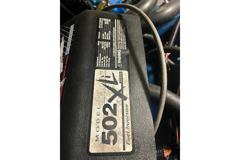 Slide: The Image of Engine label of a 1996 Tiara Yachts 3500 Express, Model 502XLi Fuel Injection. - 101