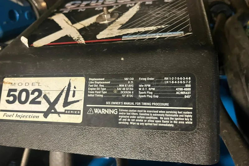 Slide: The Image of Engine specifications label for 1996 Tiara Yachts 3500 Express, featuring 502 XLi model details. - 102