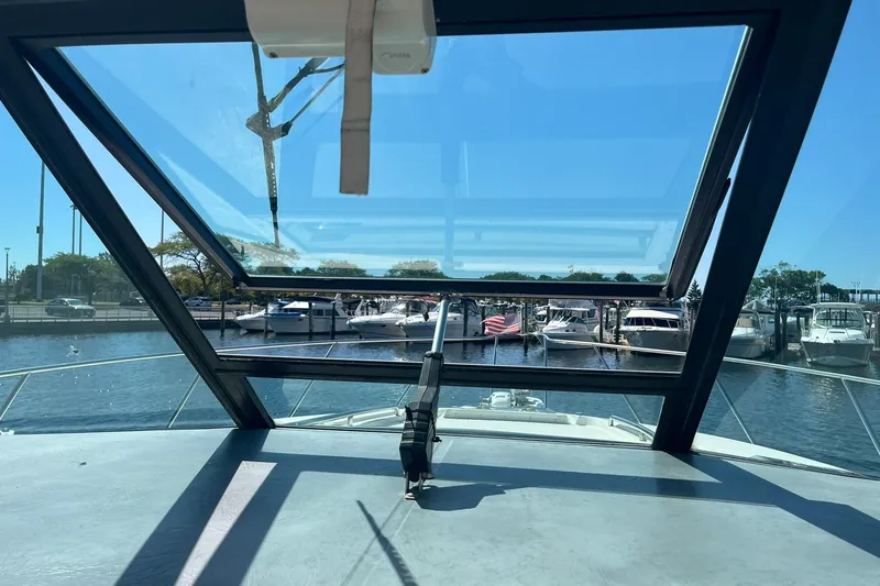 Slide: The Image of View from 1996 Tiara Yachts 3500 Express, overlooking marina with boats docked. - 46