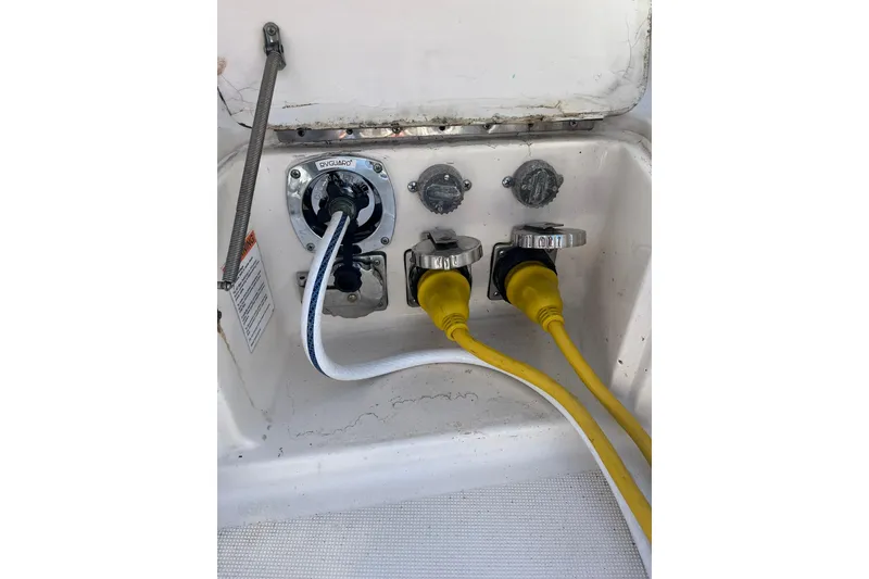 Slide: The Image of Electrical connections on a 1996 Tiara Yachts 3500 Express boat. - 9