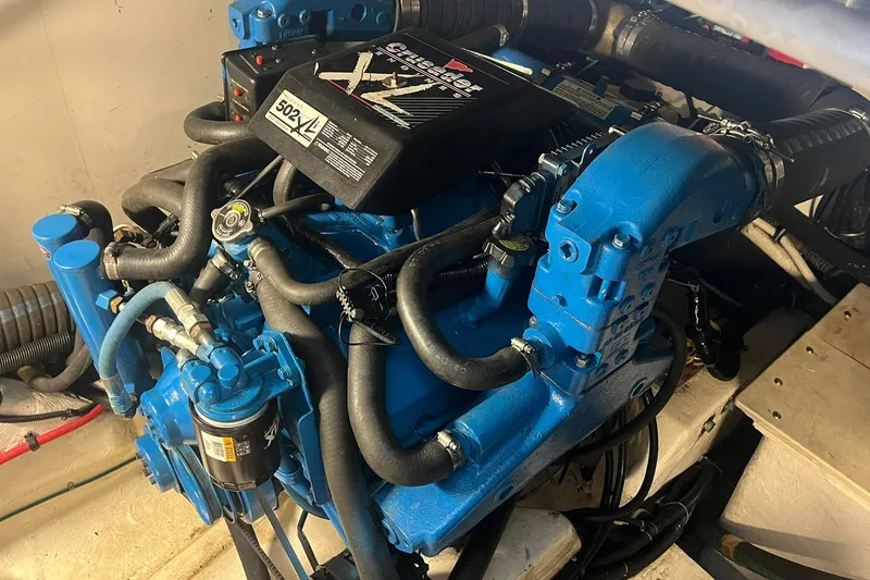 Slide: The Image of Engine of a 1996 Tiara Yachts 3500 Express, featuring a Crusader XL V8 motor. - 99