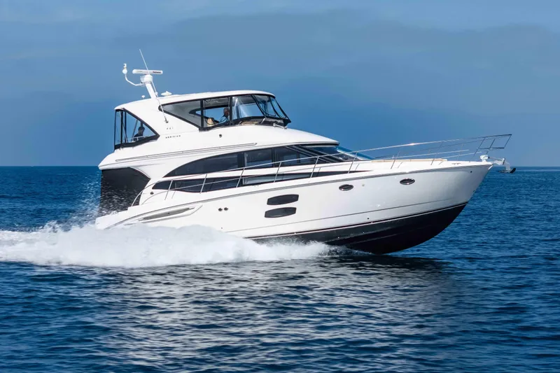The Image of 2016 Meridian 441 Sedan yacht cruising on open water. - 0