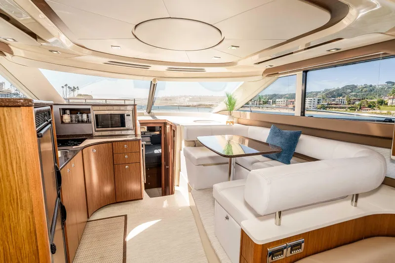 Slide: The Image of Luxurious interior of 2016 Meridian 441 Sedan yacht with modern kitchen and seating area. - 11