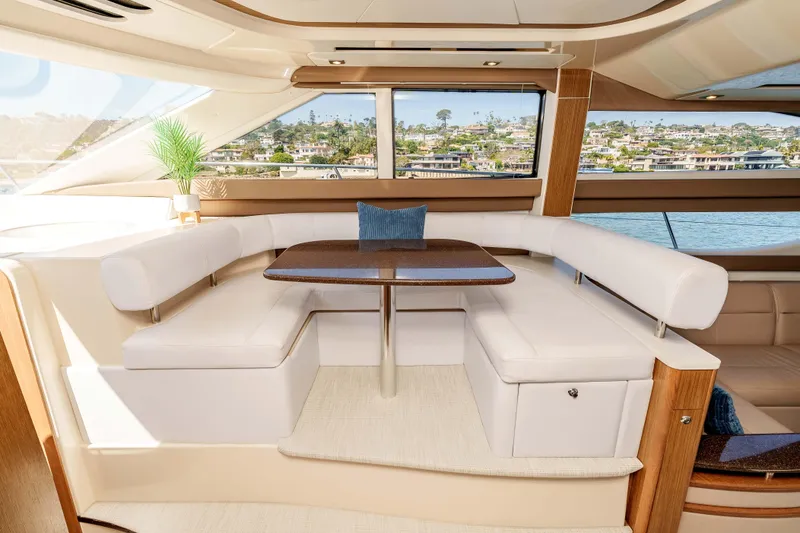 Slide: The Image of Luxurious interior of 2016 Meridian 441 Sedan yacht with elegant seating and scenic views. - 13