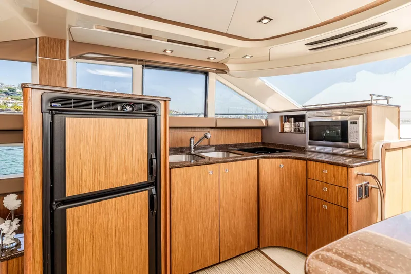 Slide: The Image of Luxurious kitchen interior of 2016 Meridian 441 Sedan yacht with modern appliances. - 14