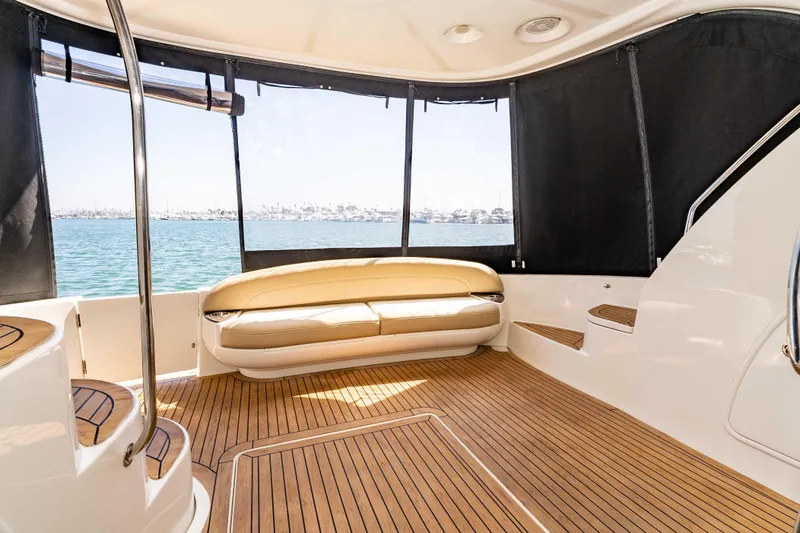 Slide: The Image of Luxurious interior of 2016 Meridian 441 Sedan yacht with wooden flooring and comfortable seating. - 21