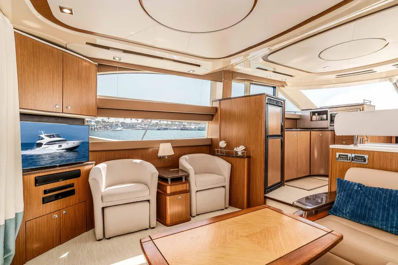 Slide: The Image of Luxurious interior of 2016 Meridian 441 Sedan yacht with elegant wood finishes and modern amenities. - 9