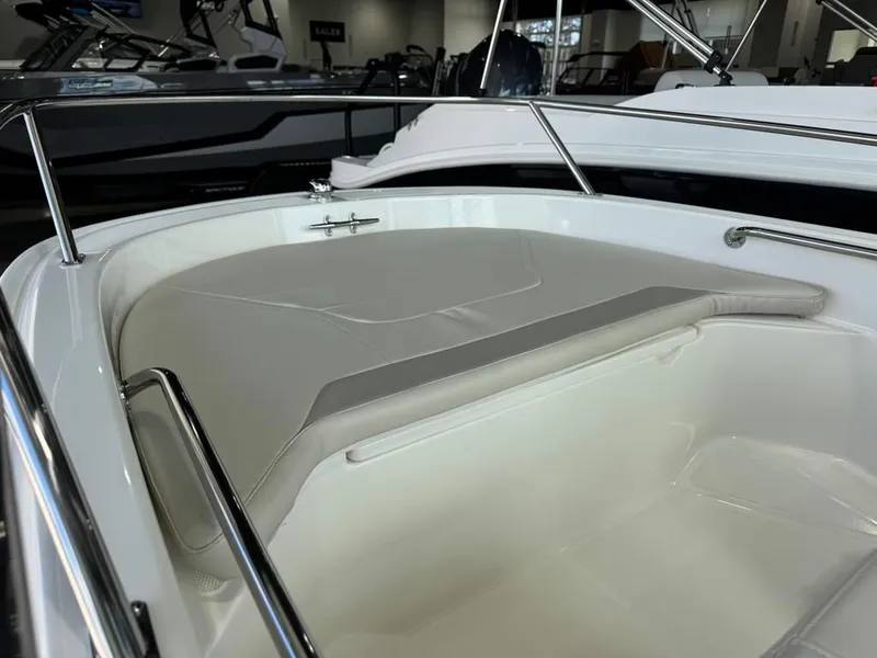 Slide: The Image of Interior view of the 2026 Boston Whaler 130 Super Sport boat. - 6
