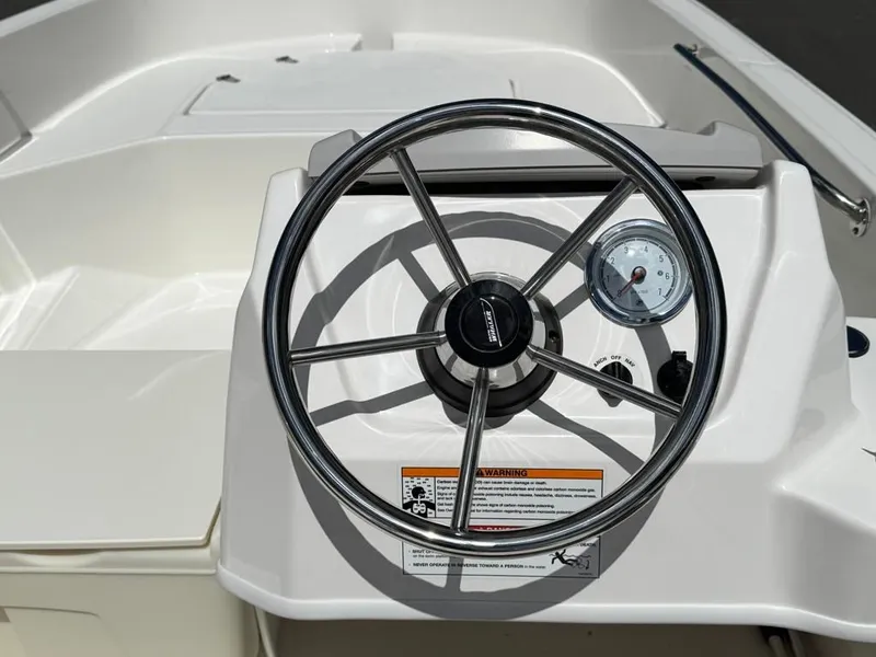 Slide: The Image of Steering wheel of Boston Whaler 160 Super Sport 2026. - 12