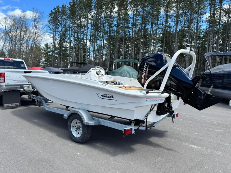 Slide: The Image of 2026 Boston Whaler 160 Super Sport on trailer parked outdoors. - 5