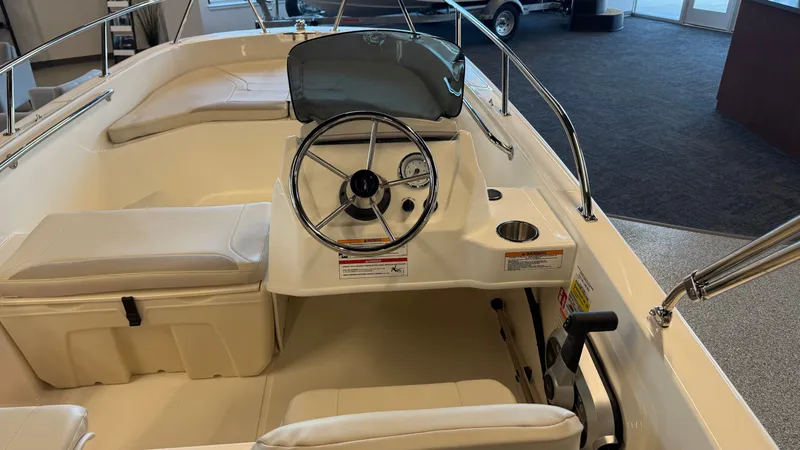 Slide: The Image of Interior view of the 2026 Boston Whaler 160 Super Sport boat. - 5