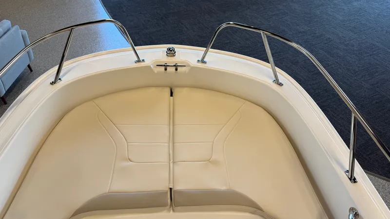 Slide: The Image of Interior of 2026 Boston Whaler 160 Super Sport with beige upholstery. - 6